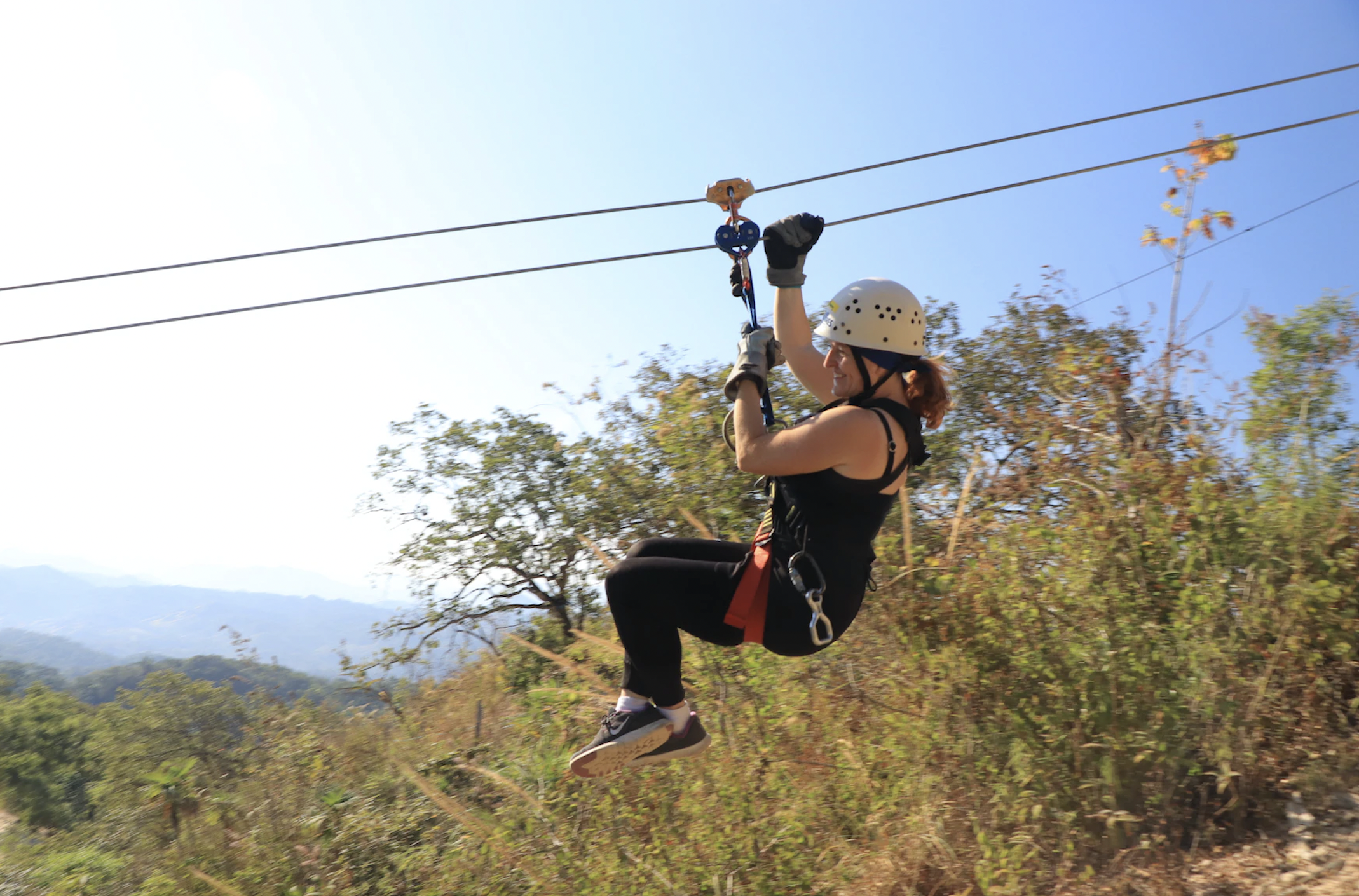A person on a zipline.